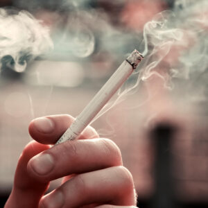 Person holding a cigarette